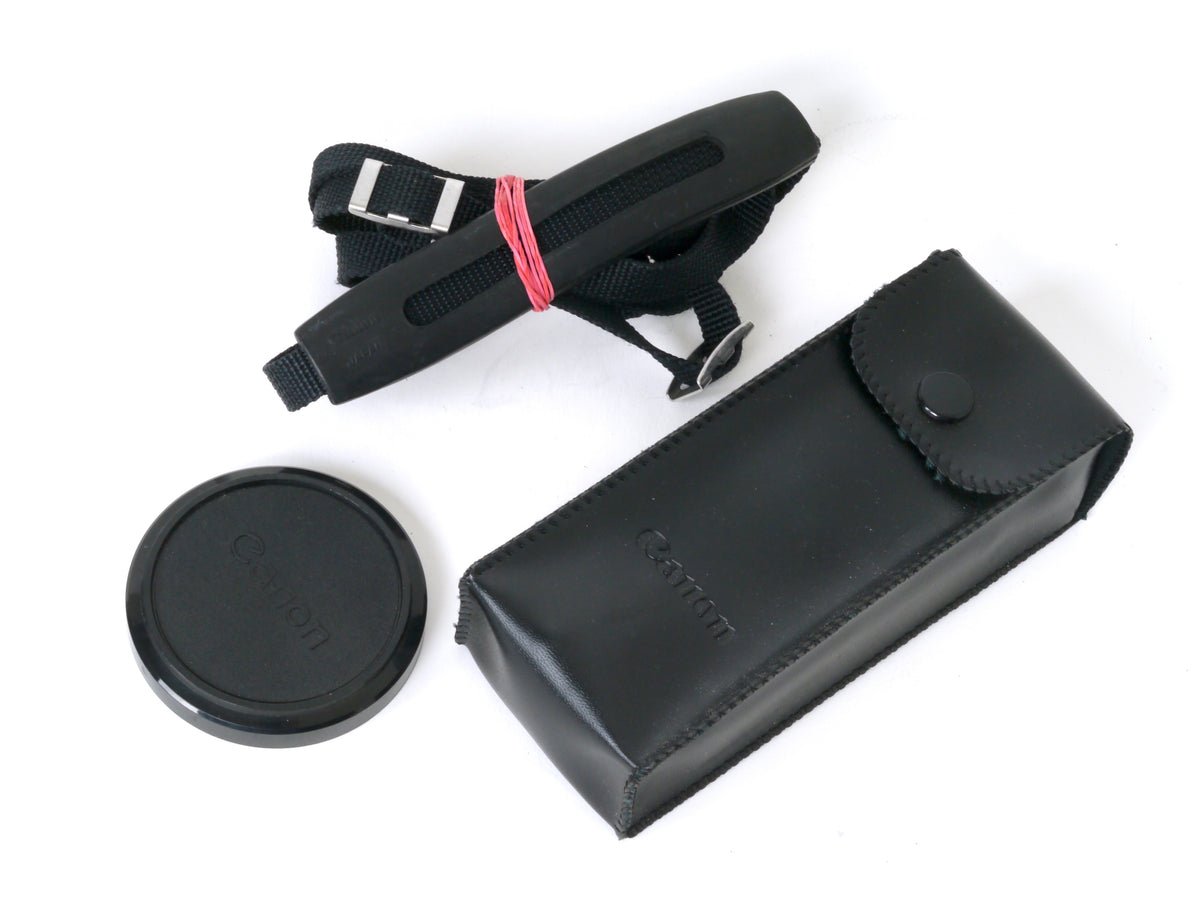 Canon A-1 Gehäuse mit FD 4/35-70mm und Power Winder A2 – Gut