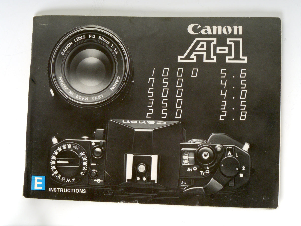 Canon A-1 Gehäuse mit FD 1,8/50mm und Power Winder A2 – Sehr gut