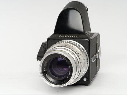 Hasselblad 501C Gehäuse mit Zeiss S-Planar 5,6/120 mm, A12 Magazin und NC2 Prisma – sehr guter Zustand