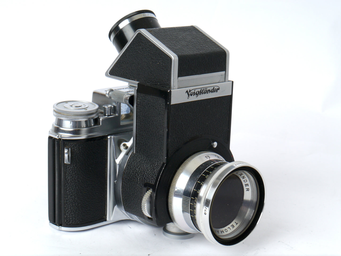 Voigtländer Prominent Gehäuse Art. 124/ mit Ultron 2/ 50mm, Telomar 5,5/ 100mm, Skoparon 3,5/ 35mm, Spiegelreflexeinheit mit 2 Sucherlupen – sehr gut