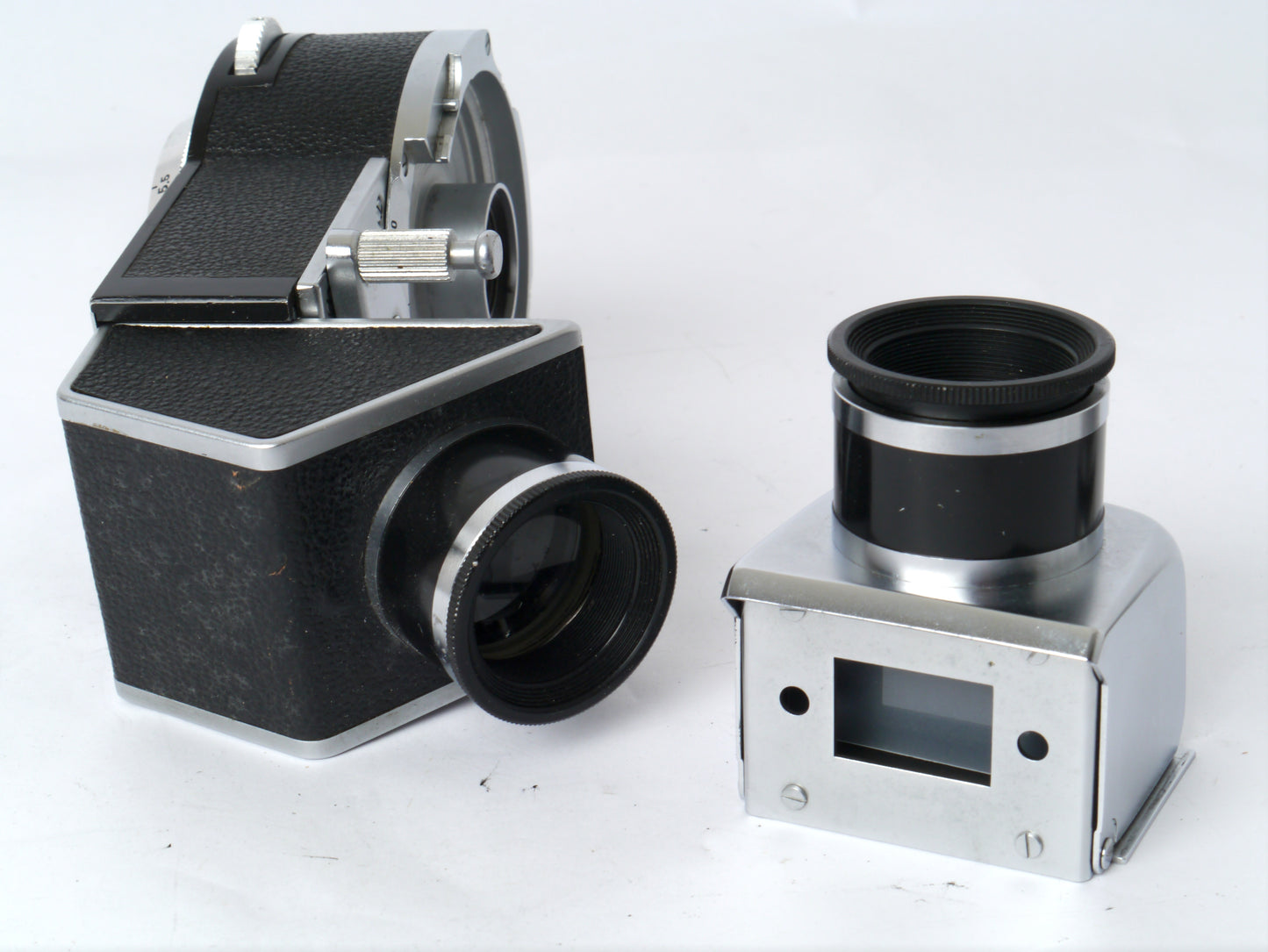 Voigtländer Prominent Gehäuse Art. 124/ mit Ultron 2/ 50mm, Telomar 5,5/ 100mm, Skoparon 3,5/ 35mm, Spiegelreflexeinheit mit 2 Sucherlupen – sehr gut