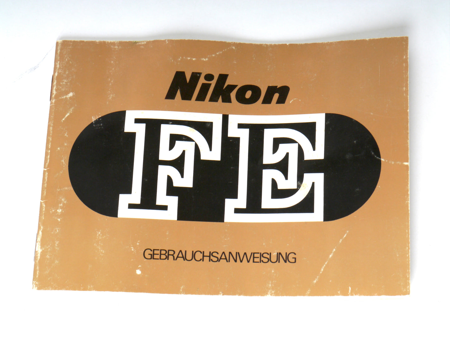 Nikon FE Gehäuse silber mit MD-12 Motorwinder – guter Zustand