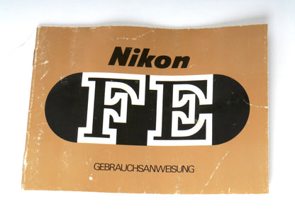 Nikon FE Gehäuse silber mit MD-12 Motorwinder – guter Zustand