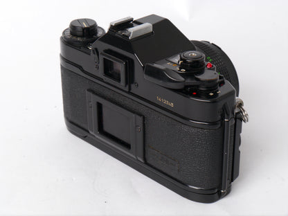 Canon A-1 Gehäuse mit FD 1,8/50mm – gut