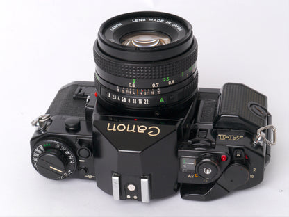 Canon A-1 Gehäuse mit FD 1,8/50mm – gut