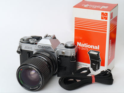 Canon AE-1 Gehäuse Silber mit Tokina MF 3,5/35-70mm – gut