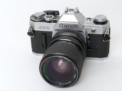 Canon AE-1 Gehäuse Silber mit Tokina MF 3,5/35-70mm – gut