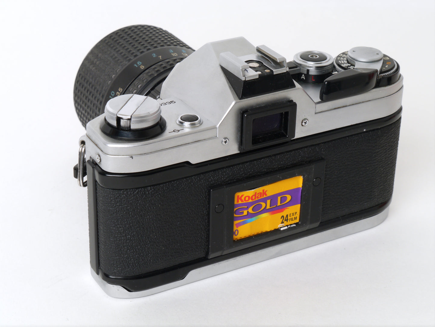 Canon AE-1 Gehäuse Silber mit Tokina MF 3,5/35-70mm – gut