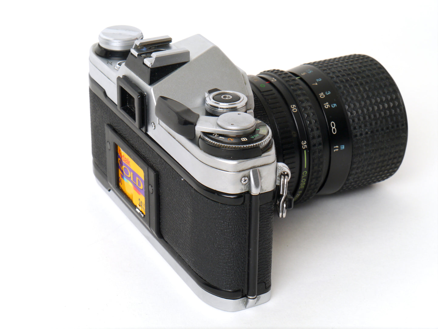 Canon AE-1 Gehäuse Silber mit Tokina MF 3,5/35-70mm – gut