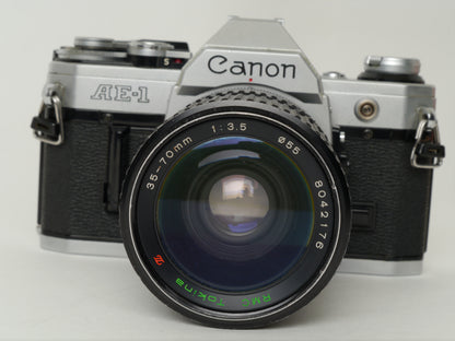 Canon AE-1 Gehäuse Silber mit Tokina MF 3,5/35-70mm – gut