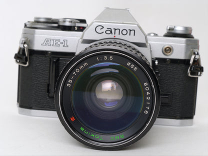 Canon AE-1 Gehäuse Silber mit Tokina MF 3,5/35-70mm – gut