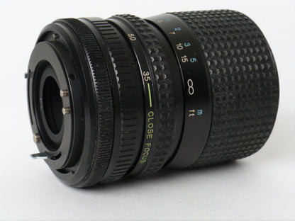 Canon AE-1 Gehäuse Silber mit Tokina MF 3,5/35-70mm – gut