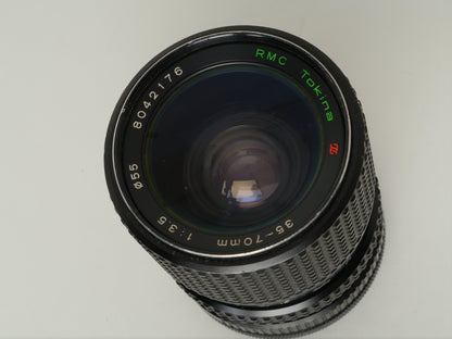 Canon AE-1 Gehäuse Silber mit Tokina MF 3,5/35-70mm – gut