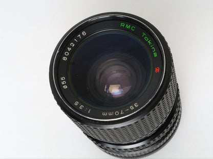 Canon AE-1 Gehäuse Silber mit Tokina MF 3,5/35-70mm – gut