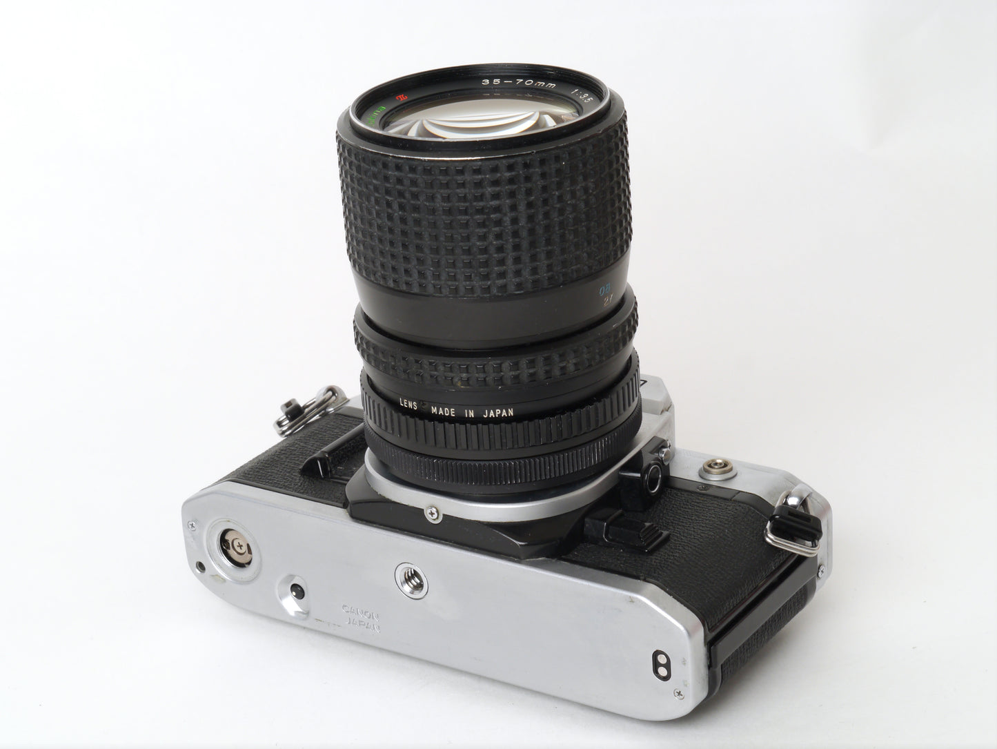 Canon AE-1 Gehäuse Silber mit Tokina MF 3,5/35-70mm – gut