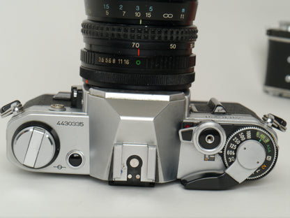 Canon AE-1 Gehäuse Silber mit Tokina MF 3,5/35-70mm – gut