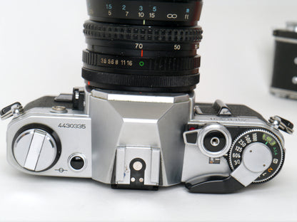Canon AE-1 Gehäuse Silber mit Tokina MF 3,5/35-70mm – gut