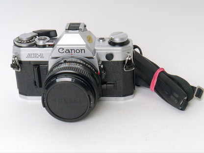 Canon AE-1 Gehäuse Chrom mit FD 1,8/50mm – Gut