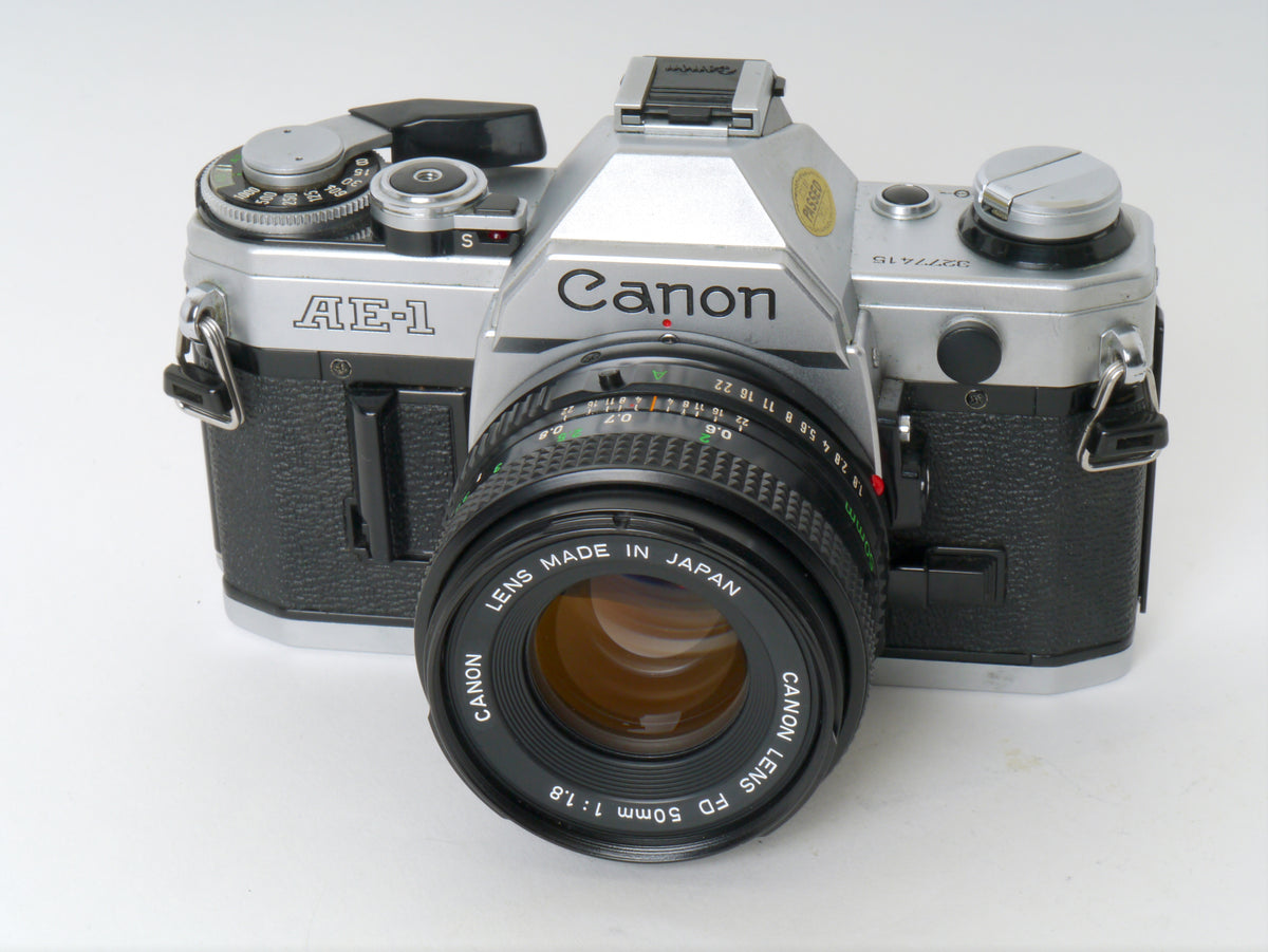 Canon AE-1 Gehäuse Chrom mit FD 1,8/50mm – Gut
