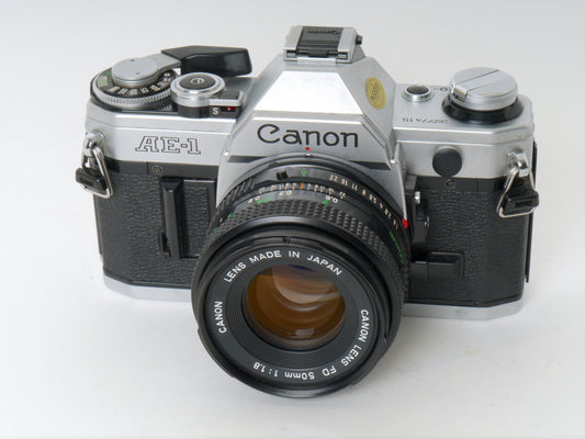 Canon AE-1 Gehäuse Chrom mit FD 1,8/50mm – Gut