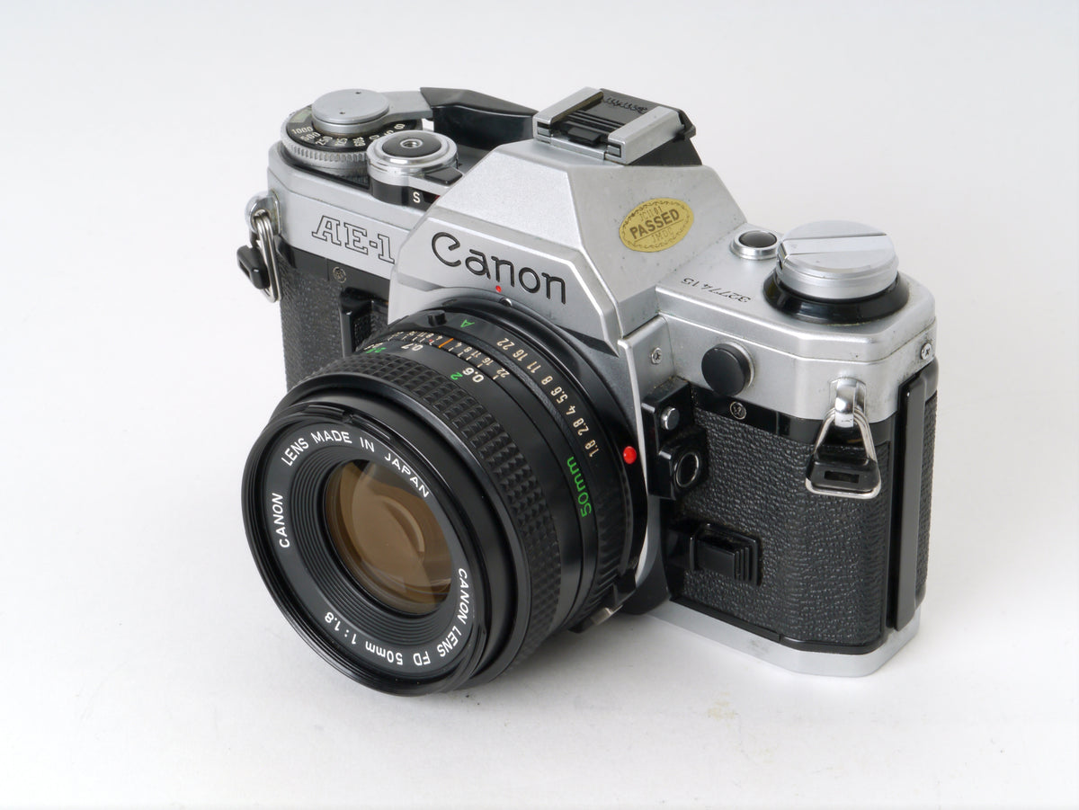 Canon AE-1 Gehäuse Chrom mit FD 1,8/50mm – Gut