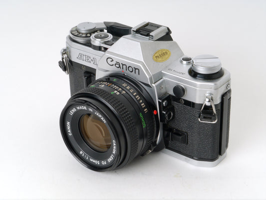 Canon AE-1 Gehäuse Chrom mit FD 1,8/50mm – Gut