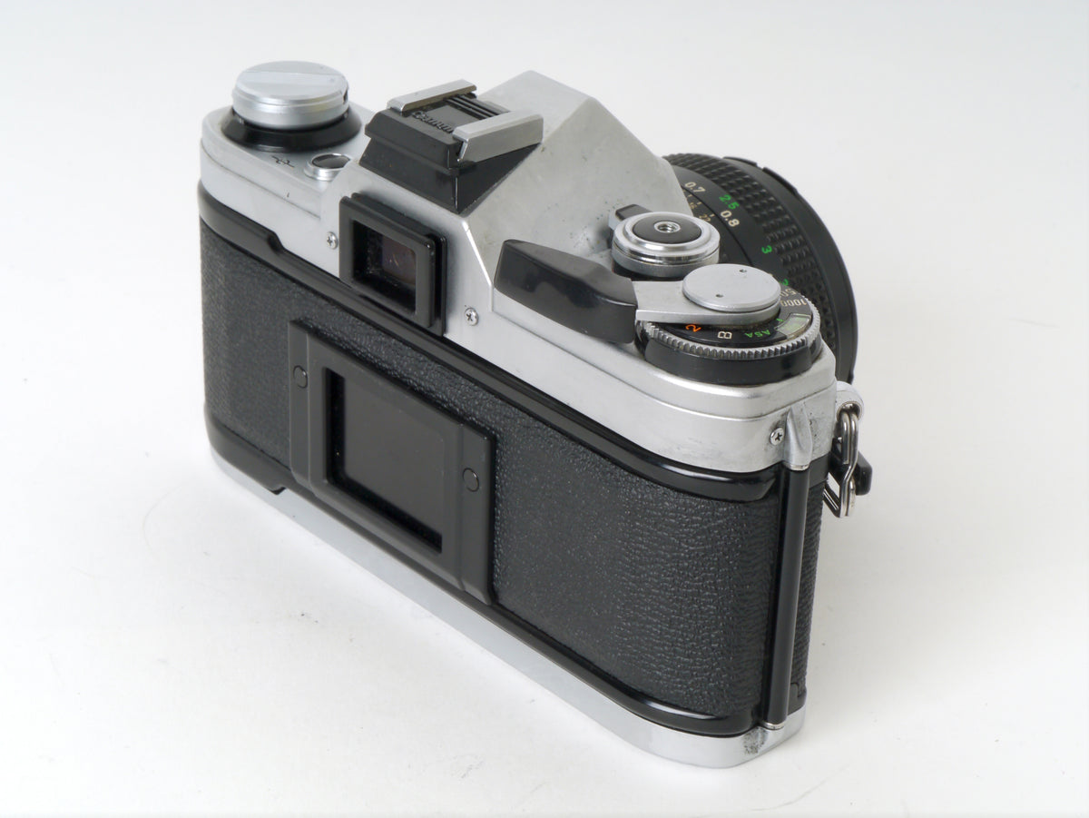 Canon AE-1 Gehäuse Chrom mit FD 1,8/50mm – Gut
