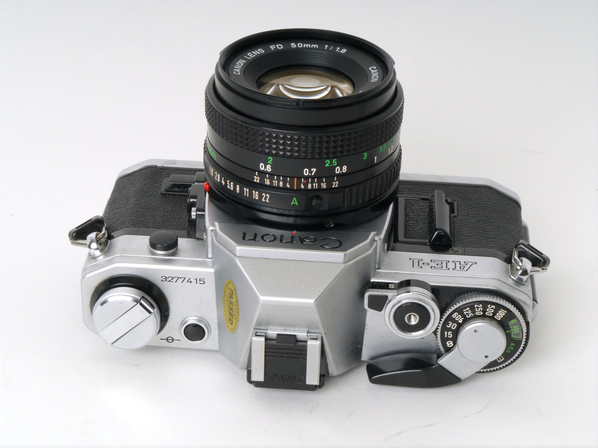 Canon AE-1 Gehäuse Chrom mit FD 1,8/50mm – Gut