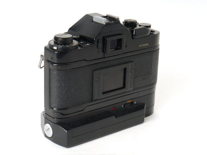 Canon A-1 Gehäuse mit FD 1,8/50mm und Power Winder A2 – Sehr gut