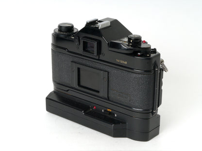 Canon A-1 Gehäuse mit FD 1,8/50mm und Power Winder A2 – Sehr gut