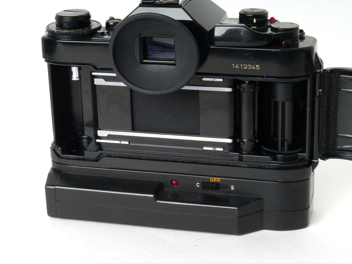 Canon A-1 Gehäuse mit FD 1,8/50mm und Power Winder A2 – Sehr gut
