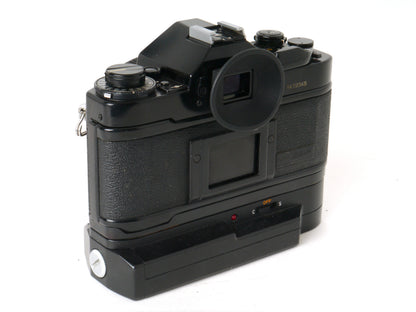 Canon A-1 Gehäuse mit FD 1,8/50mm und Power Winder A2 – Sehr gut