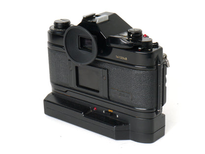 Canon A-1 Gehäuse mit FD 1,8/50mm und Power Winder A2 – Sehr gut
