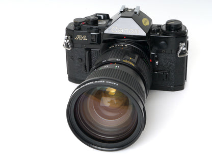 Canon A-1 Gehäuse mit FD 3,5/35-105mm – Gut