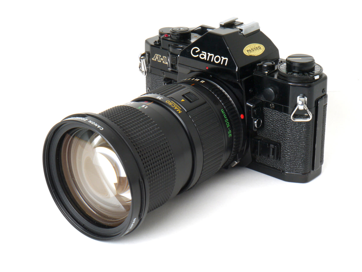 Canon A-1 Gehäuse mit FD 3,5/35-105mm – Gut