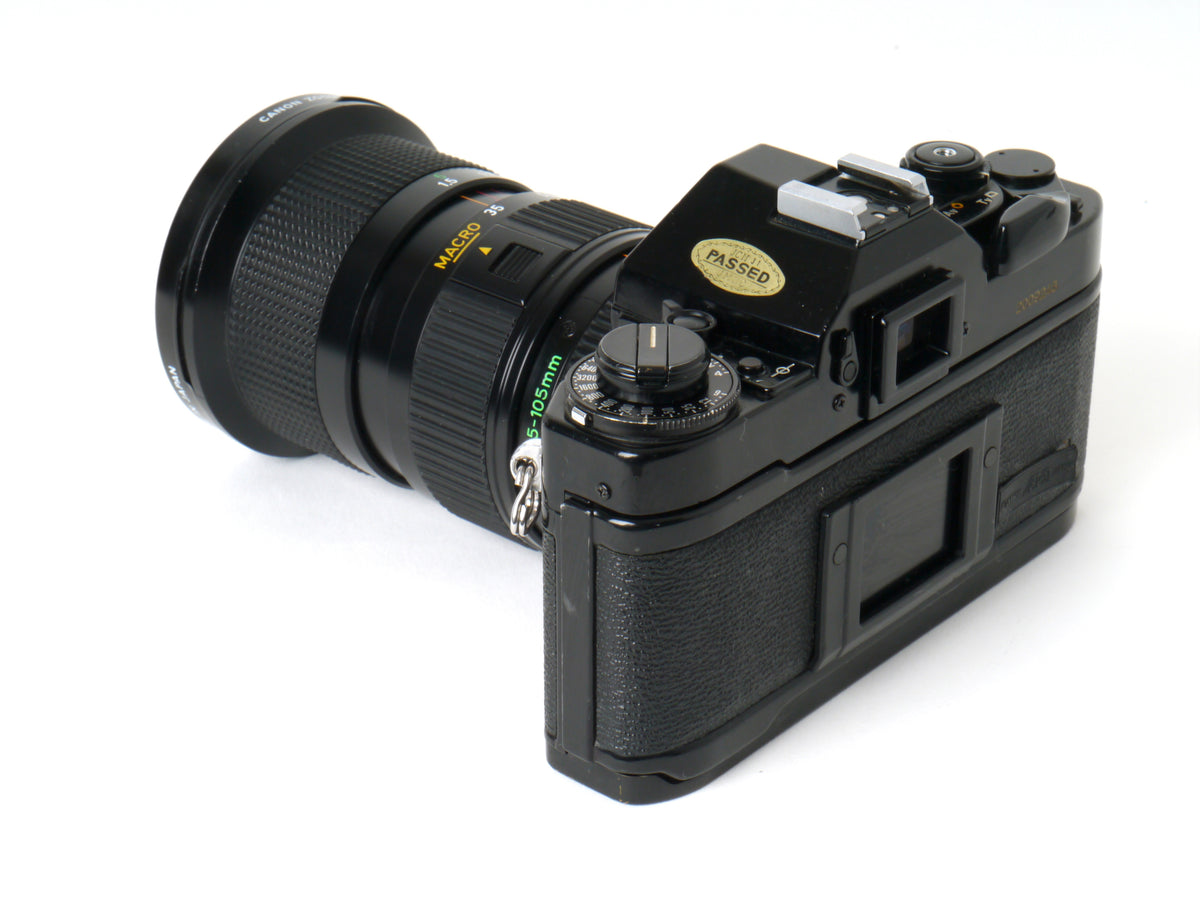 Canon A-1 Gehäuse mit FD 3,5/35-105mm – Gut