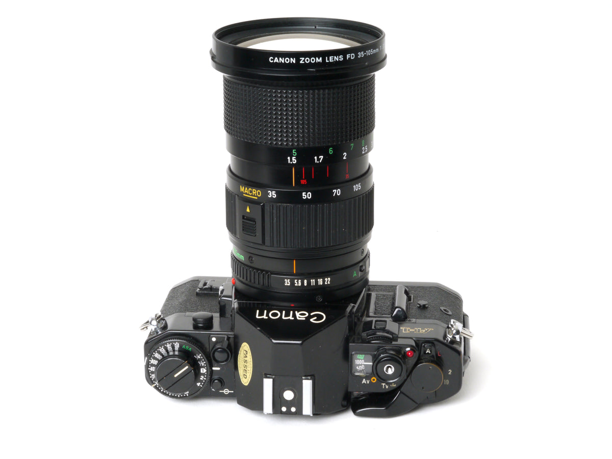 Canon A-1 Gehäuse mit FD 3,5/35-105mm – Gut