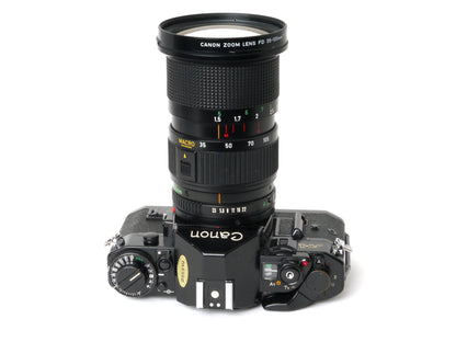 Canon A-1 Gehäuse mit FD 3,5/35-105mm – Gut