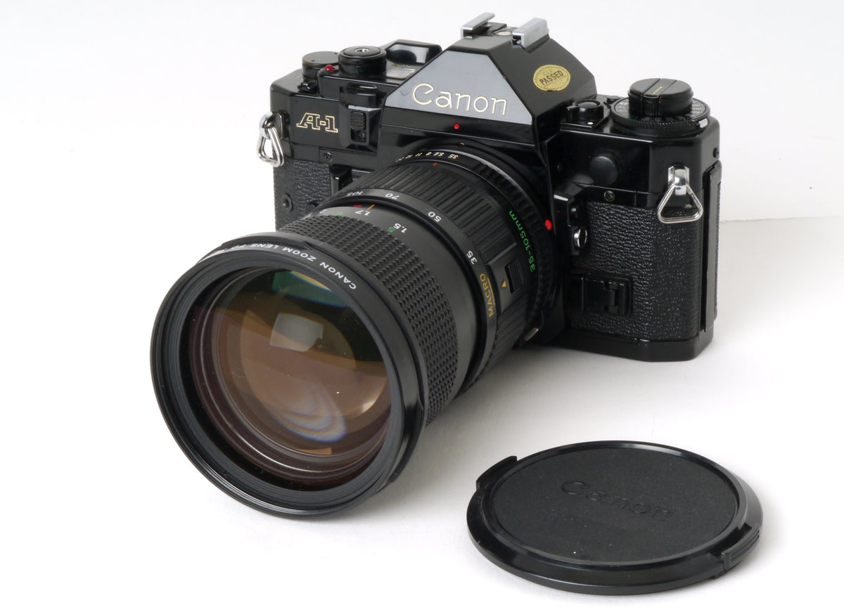 Canon A-1 Gehäuse mit FD 3,5/35-105mm – Gut