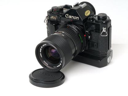 Canon A-1 Gehäuse mit FD 4/35-70mm und Power Winder A2 – Gut