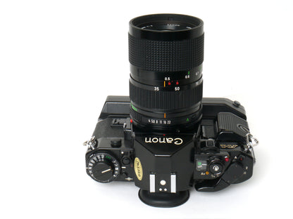 Canon A-1 Gehäuse mit FD 4/35-70mm und Power Winder A2 – Gut